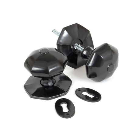 This is an image showing From The Anvil - Black Large Octagonal Mortice/Rim Knob Set available from trade door handles, quick delivery and discounted prices