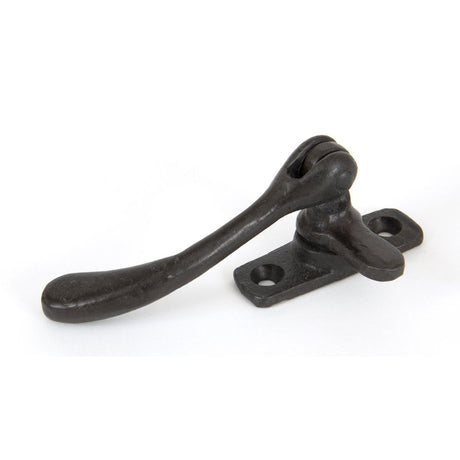 This is an image showing From The Anvil - Beeswax Handmade Peardrop Fastener available from trade door handles, quick delivery and discounted prices