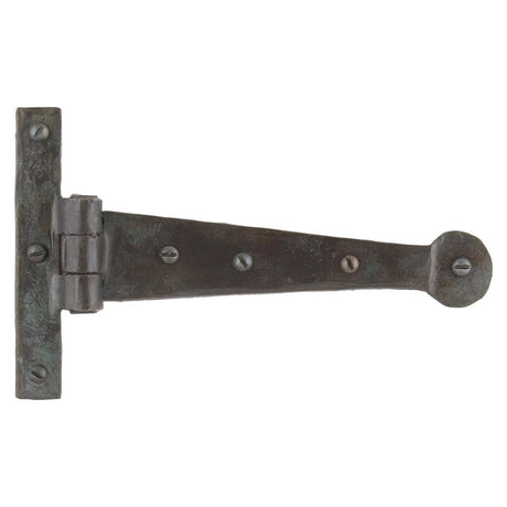 This is an image showing From The Anvil - Beeswax 6" Penny End T Hinge (pair) available from trade door handles, quick delivery and discounted prices