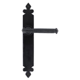 This is an image showing From The Anvil - Black Tudor Lever Latch Set available from trade door handles, quick delivery and discounted prices