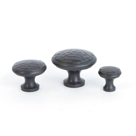 This is an image showing From The Anvil - Beeswax Hammered Cabinet Knob - Large available from trade door handles, quick delivery and discounted prices