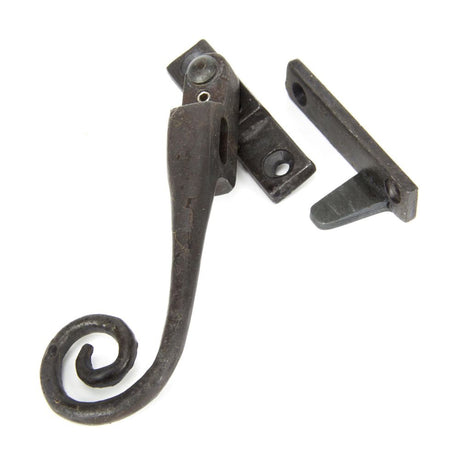 This is an image showing From The Anvil - Beeswax LH Locking Night-vent Monkeytail Fastener available from trade door handles, quick delivery and discounted prices