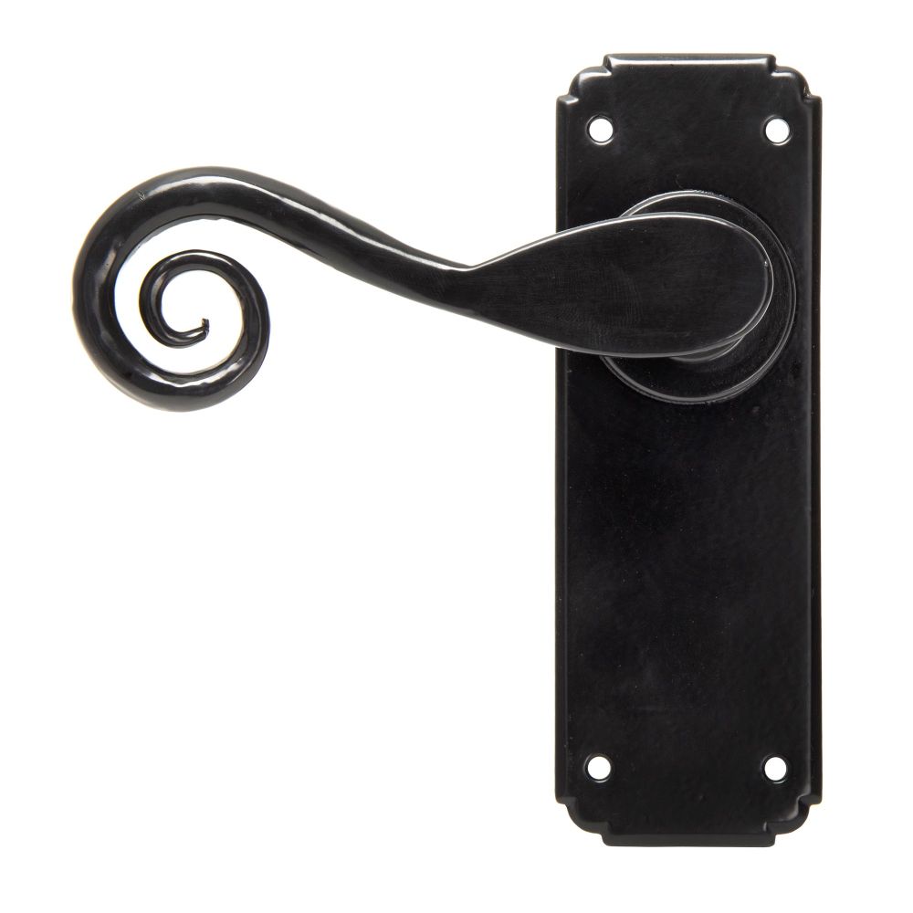 This is an image showing From The Anvil - Black Monkeytail Lever Latch Set available from trade door handles, quick delivery and discounted prices