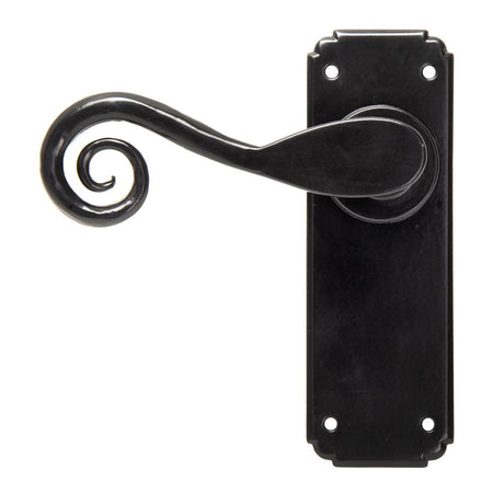 This is an image showing From The Anvil - Black Monkeytail Lever Latch Set available from trade door handles, quick delivery and discounted prices