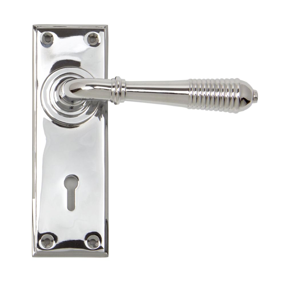 This is an image showing From The Anvil - Polished Chrome Reeded Lever Lock Set available from trade door handles, quick delivery and discounted prices