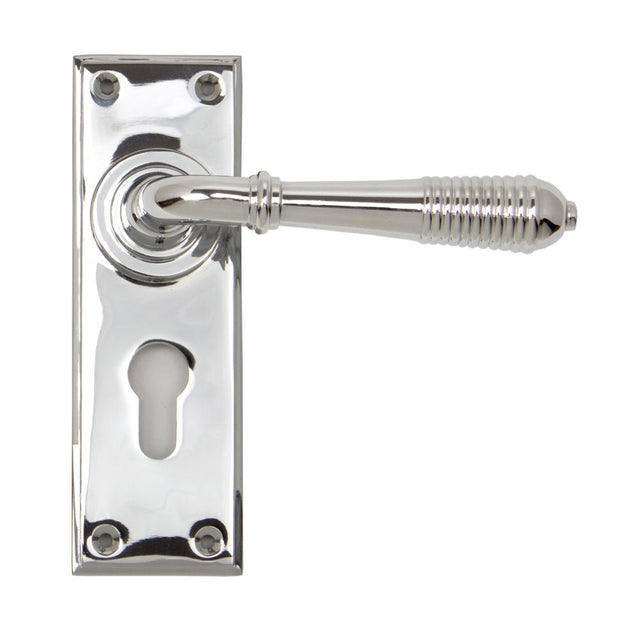 This is an image showing From The Anvil - Polished Chrome Reeded Lever Euro Lock Set available from trade door handles, quick delivery and discounted prices