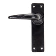 This is an image showing From The Anvil - Black Smooth Lever Latch Set available from trade door handles, quick delivery and discounted prices