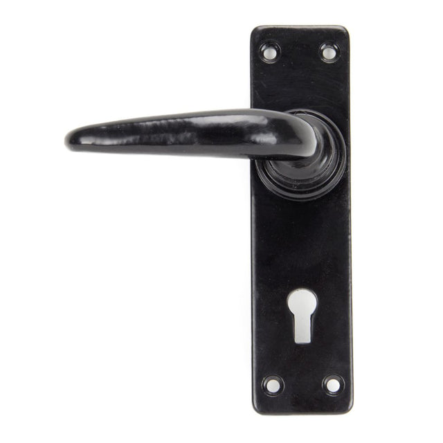 This is an image showing From The Anvil - Black Smooth Lever Lock Set available from trade door handles, quick delivery and discounted prices