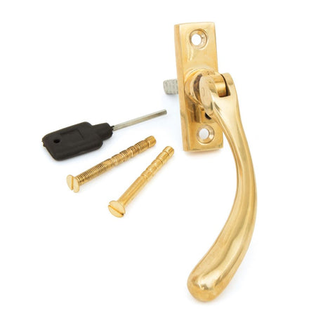This is an image showing From The Anvil - Polished Brass Slim Peardrop Espag - LH available from trade door handles, quick delivery and discounted prices