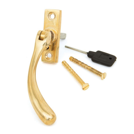 This is an image showing From The Anvil - Polished Brass Slim Peardrop Espag - RH available from trade door handles, quick delivery and discounted prices