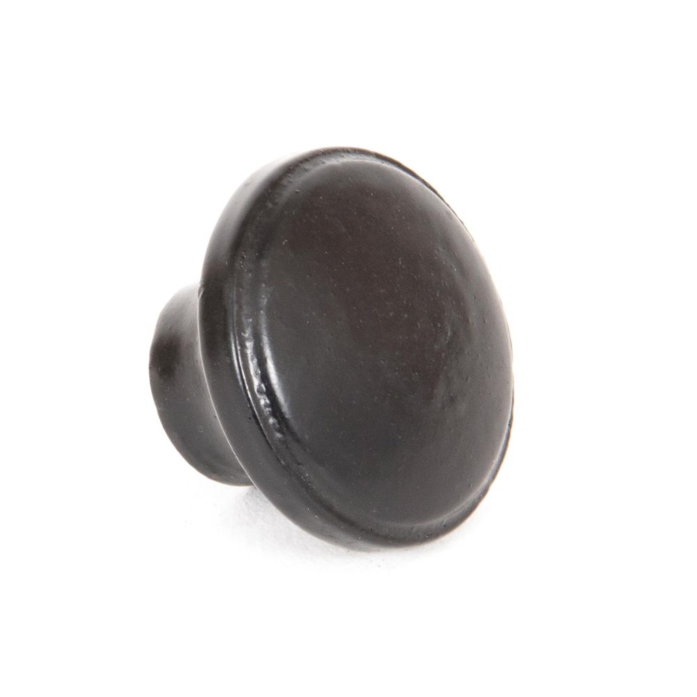 This is an image showing From The Anvil - Black Ribbed Cabinet Knob available from trade door handles, quick delivery and discounted prices