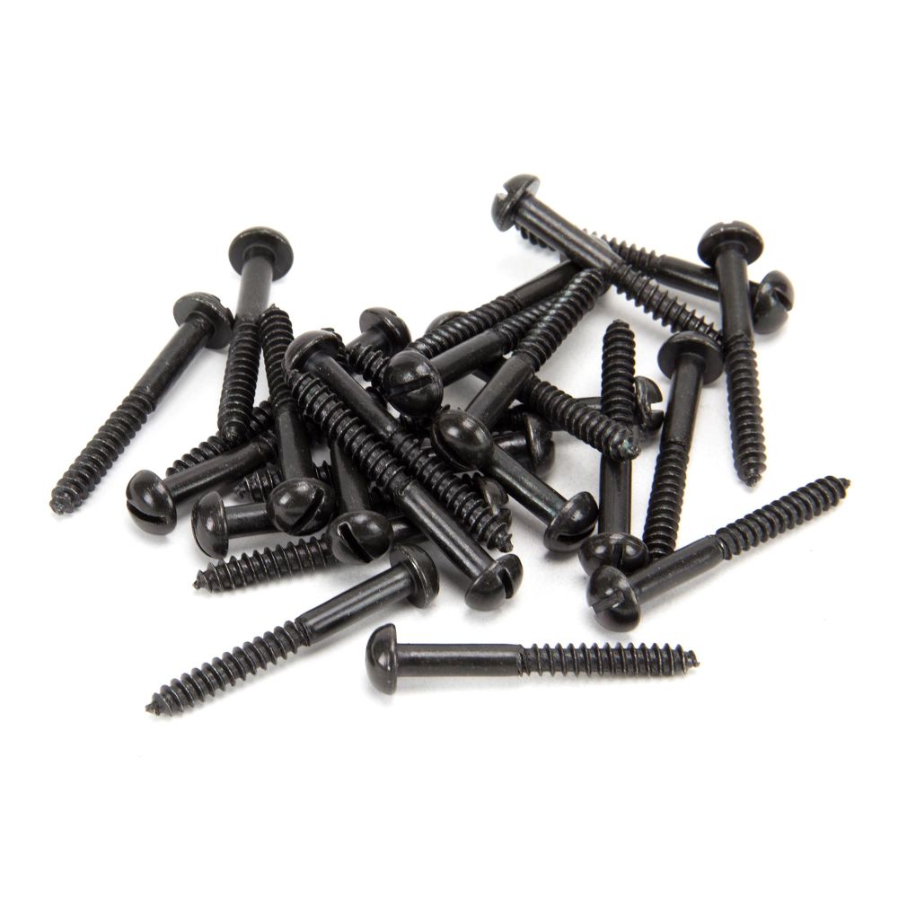 This is an image showing From The Anvil - Black 10 x 1 1/2" Round Head Screws (25) available from trade door handles, quick delivery and discounted prices