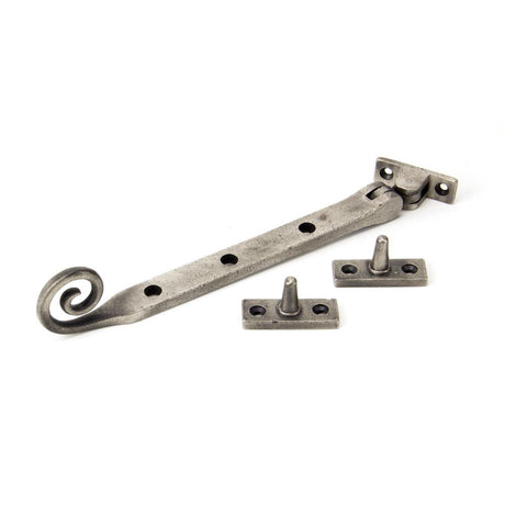 This is an image showing From The Anvil - Antique Pewter 8" Monkeytail Stay available from trade door handles, quick delivery and discounted prices