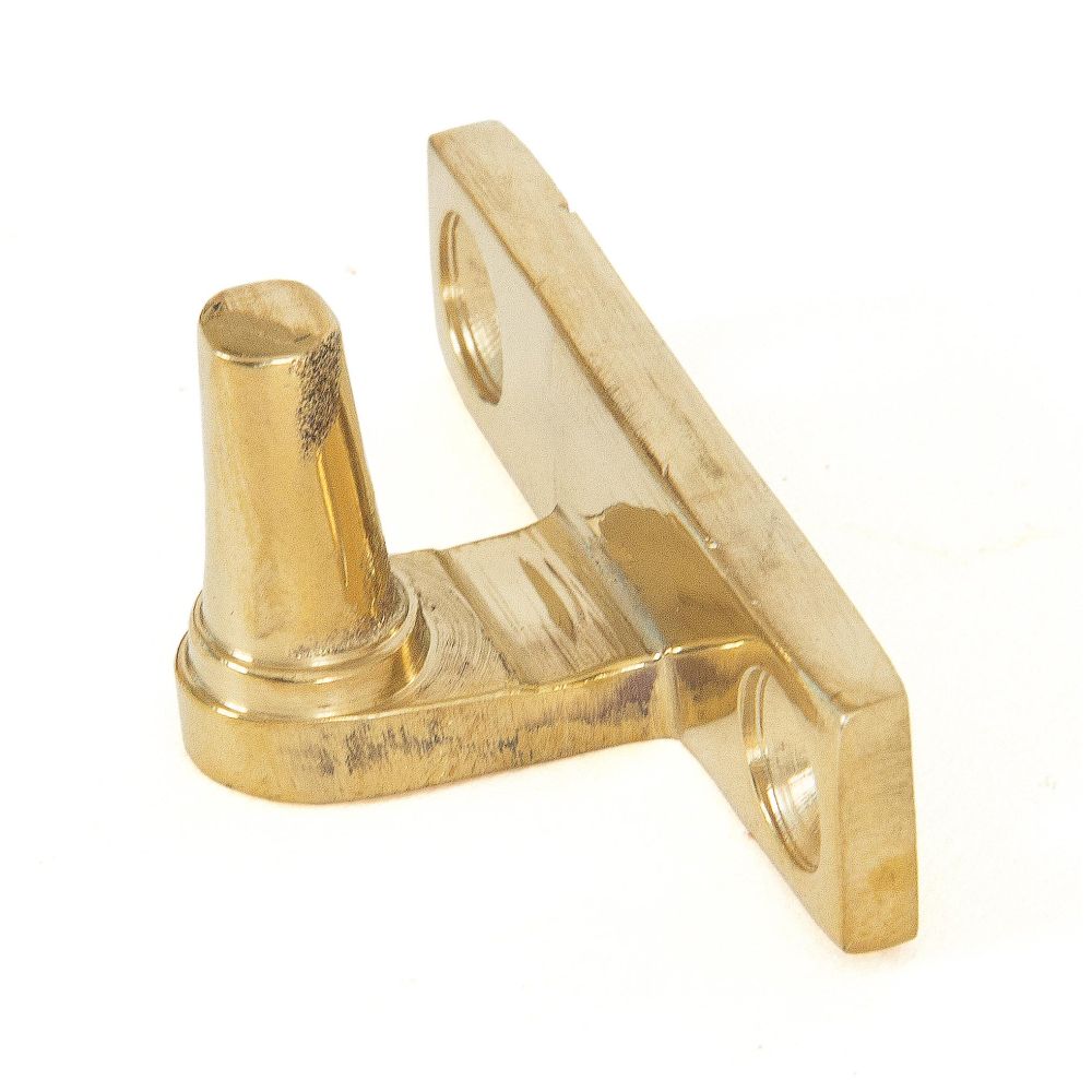 This is an image showing From The Anvil - Polished Brass Cranked Stay Pin available from trade door handles, quick delivery and discounted prices