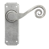 This is an image showing From The Anvil - Pewter Monkeytail Lever Latch Set available from trade door handles, quick delivery and discounted prices