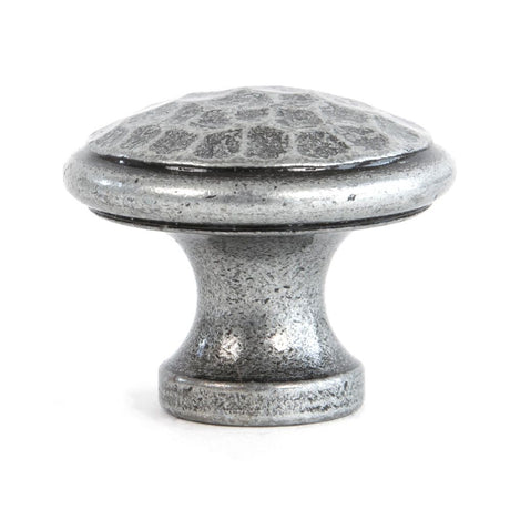 This is an image showing From The Anvil - Pewter Hammered Cabinet Knob - Medium available from trade door handles, quick delivery and discounted prices