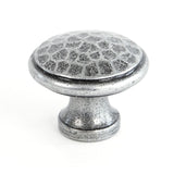 This is an image showing From The Anvil - Pewter Hammered Cabinet Knob - Medium available from trade door handles, quick delivery and discounted prices