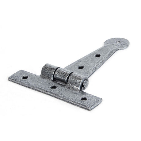 This is an image showing From The Anvil - Pewter 4" Penny End T Hinge (pair) available from trade door handles, quick delivery and discounted prices