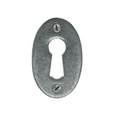 This is an image showing From The Anvil - Pewter Oval Escutcheon available from trade door handles, quick delivery and discounted prices