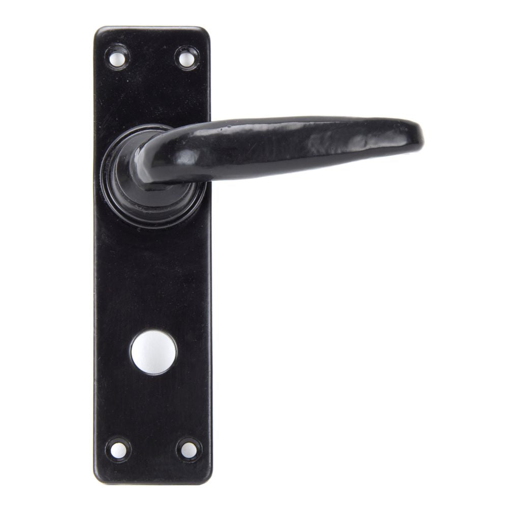 This is an image showing From The Anvil - Black Smooth Lever Bathroom Set available from trade door handles, quick delivery and discounted prices