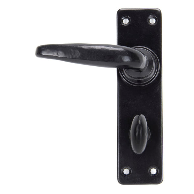 This is an image showing From The Anvil - Black Smooth Lever Bathroom Set available from trade door handles, quick delivery and discounted prices