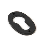 This is an image showing From The Anvil - Black Oval Euro Escutcheon available from trade door handles, quick delivery and discounted prices