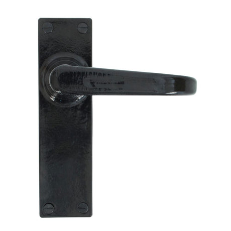 This is an image showing From The Anvil - Black Deluxe Lever Latch Set available from trade door handles, quick delivery and discounted prices