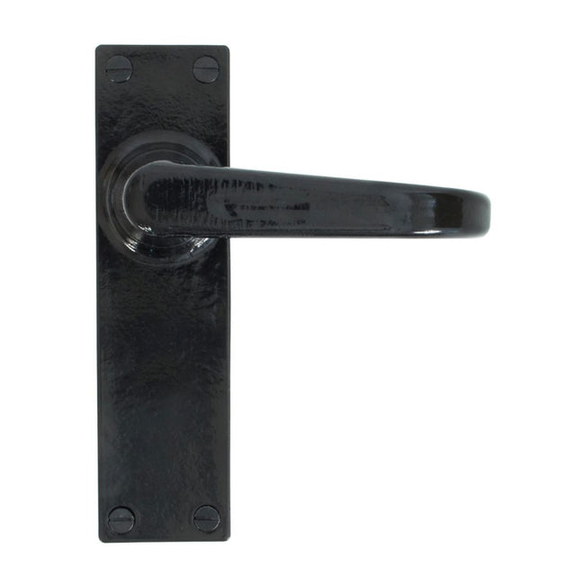 This is an image showing From The Anvil - Black Deluxe Lever Latch Set available from trade door handles, quick delivery and discounted prices