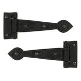 This is an image showing From The Anvil - Black Textured 6" Cast T Hinge (pair) available from trade door handles, quick delivery and discounted prices