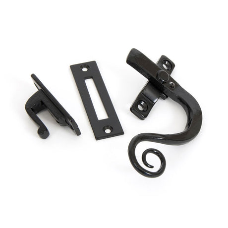 This is an image showing From The Anvil - Black Locking Monkeytail Fastener - RH available from trade door handles, quick delivery and discounted prices