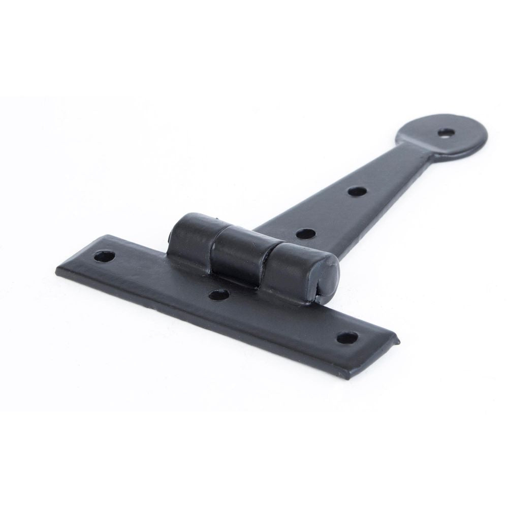This is an image showing From The Anvil - Black 4" Penny End T Hinge (pair) available from trade door handles, quick delivery and discounted prices