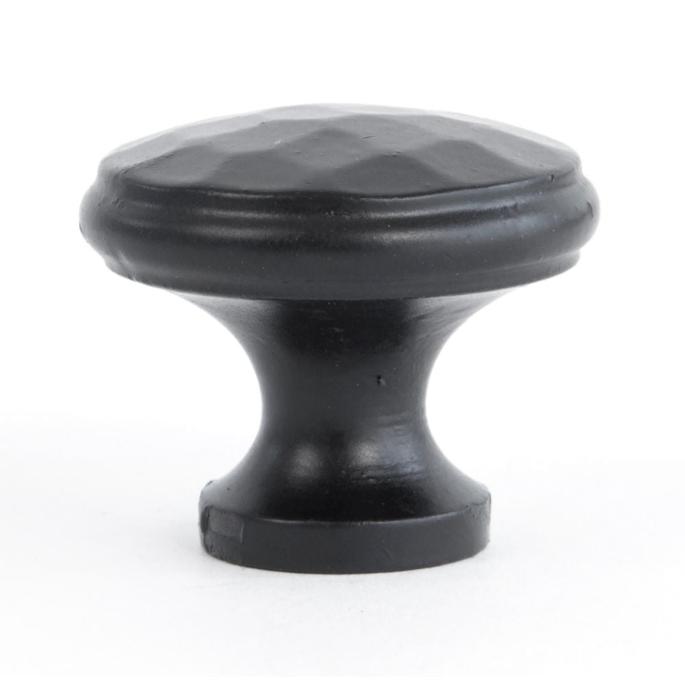 This is an image showing From The Anvil - Black Hammered Cabinet Knob - Medium available from trade door handles, quick delivery and discounted prices