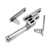 This is an image showing From The Anvil - Pewter Locking Night-Vent Regency Fastener available from trade door handles, quick delivery and discounted prices