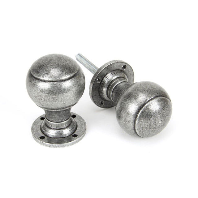 This is an image showing From The Anvil - Pewter Regency Mortice/Rim Knob Set available from trade door handles, quick delivery and discounted prices