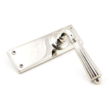 This is an image showing From The Anvil - Polished Nickel Hinton Lever Latch Set available from trade door handles, quick delivery and discounted prices