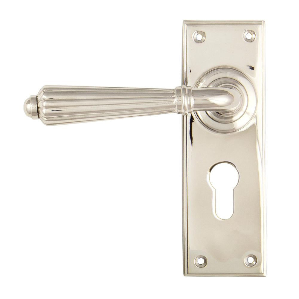 This is an image showing From The Anvil - Polished Nickel Hinton Lever Euro Lock Set available from trade door handles, quick delivery and discounted prices