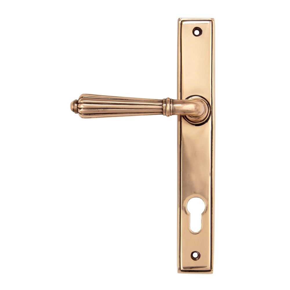 This is an image showing From The Anvil - Polished Bronze Hinton Slimline Lever Espag. Lock Set available from trade door handles, quick delivery and discounted prices