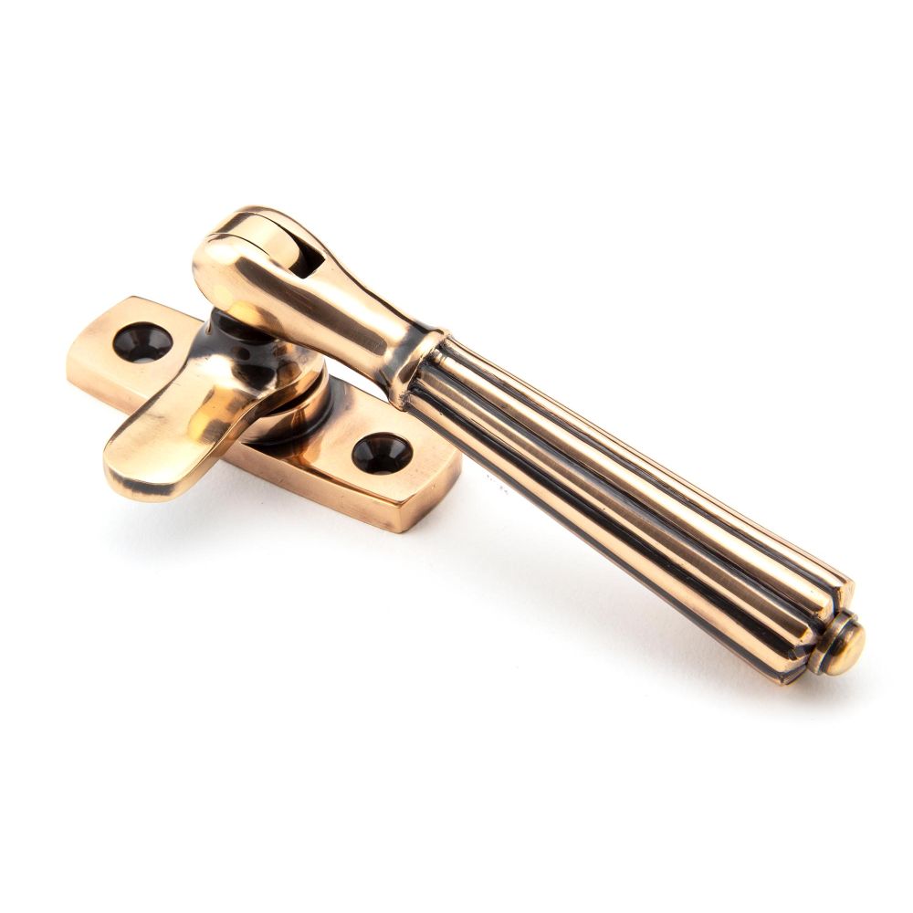 This is an image showing From The Anvil - Polished Bronze Locking Hinton Fastener available from trade door handles, quick delivery and discounted prices