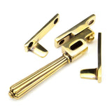 This is an image showing From The Anvil - Aged Brass Night-Vent Locking Hinton Fastener available from trade door handles, quick delivery and discounted prices