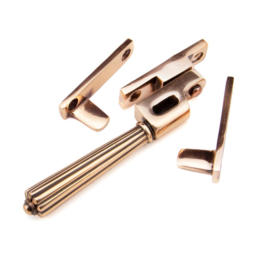 This is an image showing From The Anvil - Polished Bronze Night-Vent Locking Hinton Fastener available from trade door handles, quick delivery and discounted prices