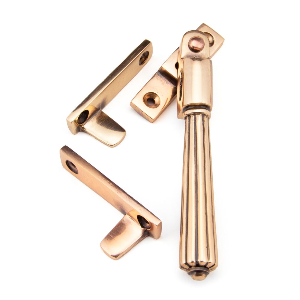 This is an image showing From The Anvil - Polished Bronze Night-Vent Locking Hinton Fastener available from trade door handles, quick delivery and discounted prices