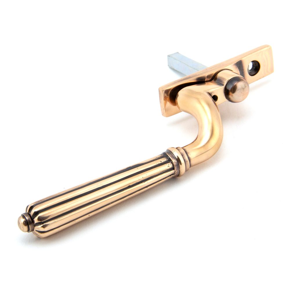 This is an image showing From The Anvil - Polished Bronze Hinton Espag - RH available from trade door handles, quick delivery and discounted prices