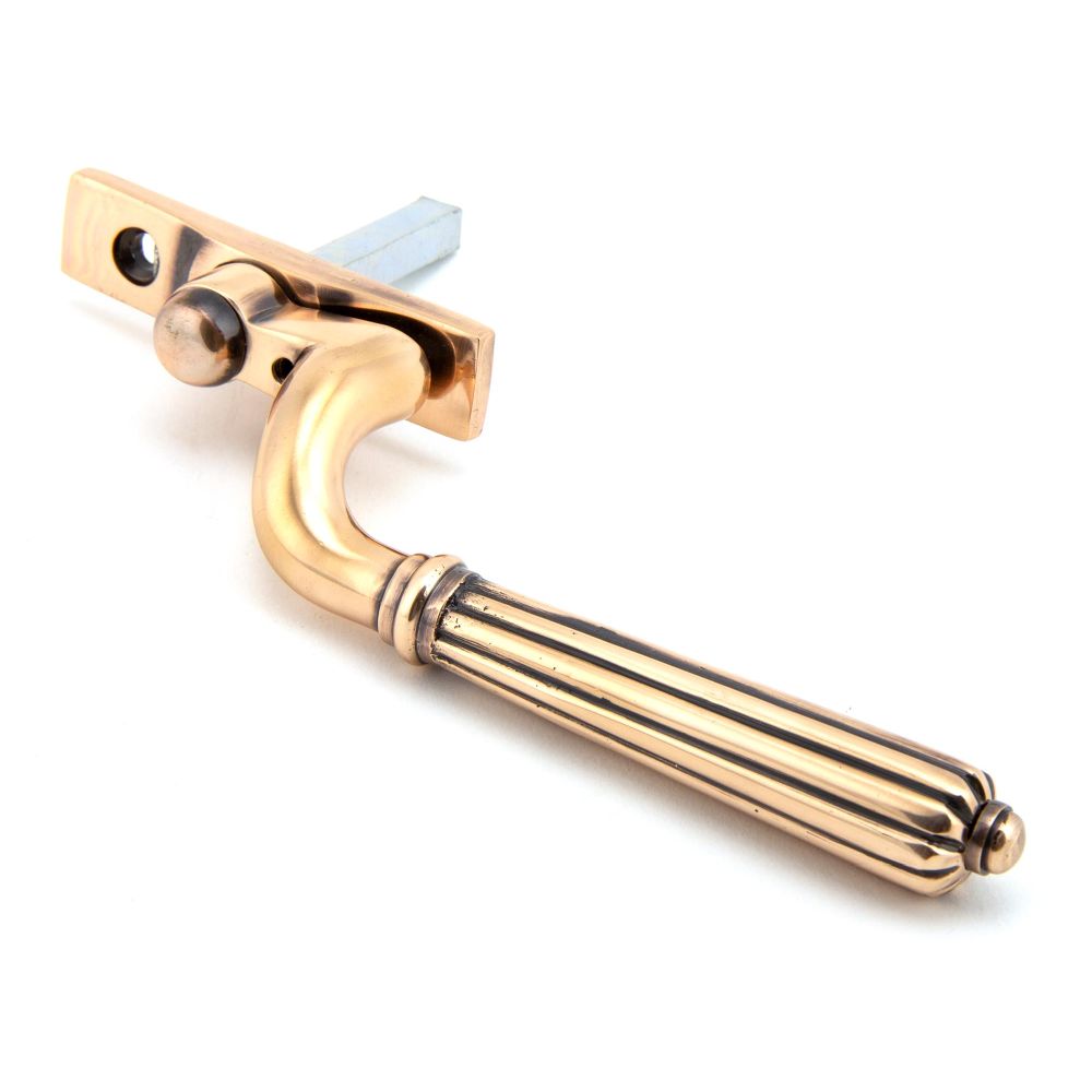 This is an image showing From The Anvil - Polished Bronze Hinton Espag - LH available from trade door handles, quick delivery and discounted prices