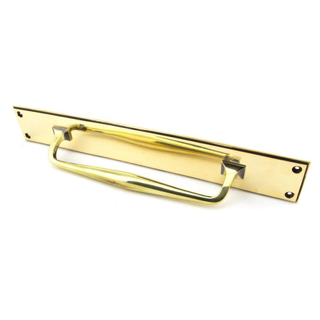 This is an image showing From The Anvil - Aged Brass 425mm Art Deco Pull Handle on Backplate available from trade door handles, quick delivery and discounted prices