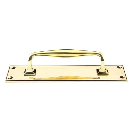 This is an image showing From The Anvil - Aged Brass 300mm Art Deco Pull Handle on Backplate available from trade door handles, quick delivery and discounted prices