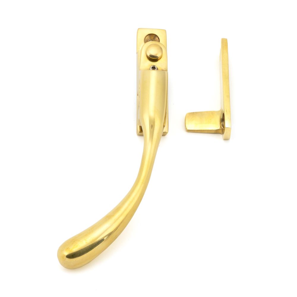 This is an image showing From The Anvil - Polished Brass Night-Vent Locking Peardrop Fastener - LH available from trade door handles, quick delivery and discounted prices