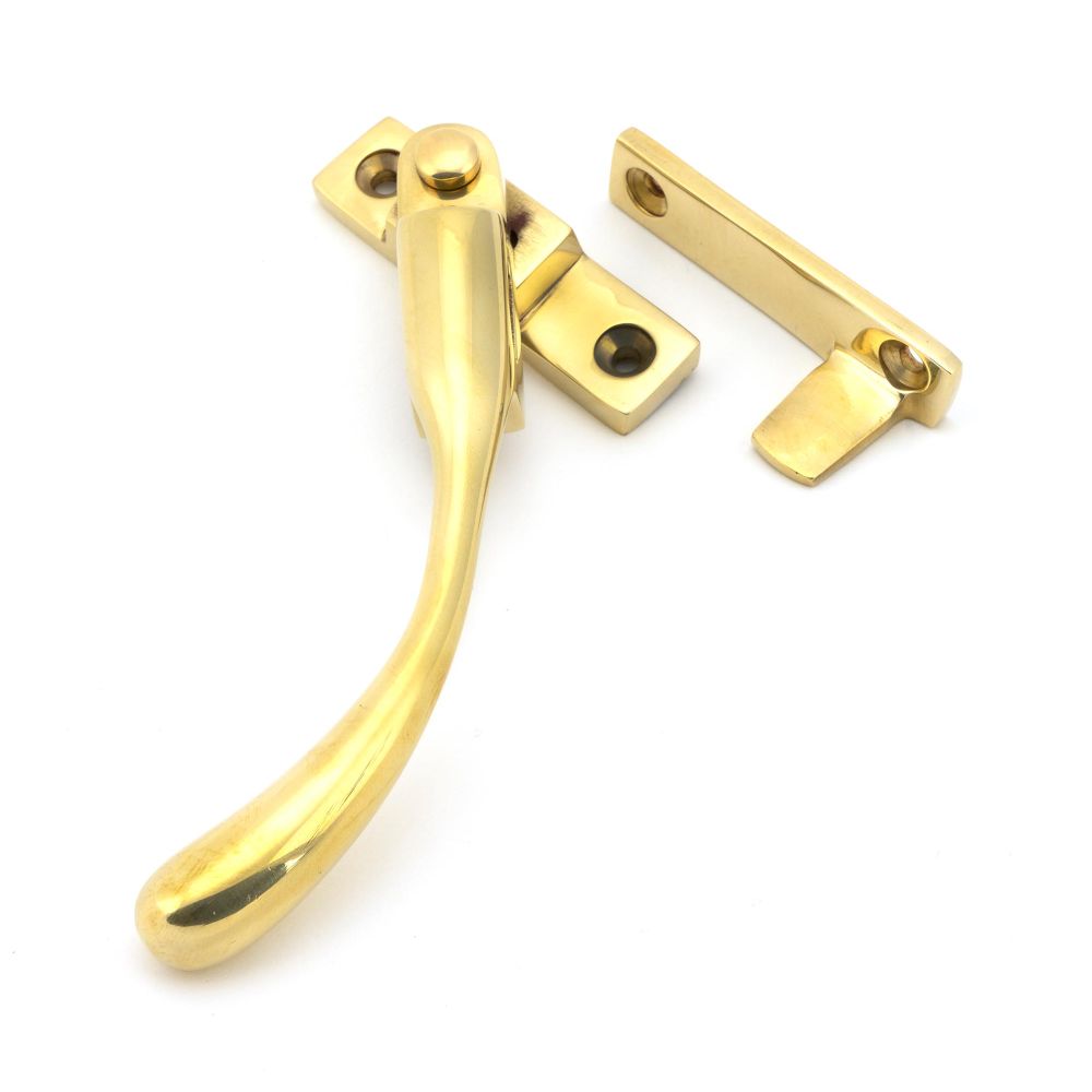 This is an image showing From The Anvil - Polished Brass Night-Vent Locking Peardrop Fastener - LH available from trade door handles, quick delivery and discounted prices