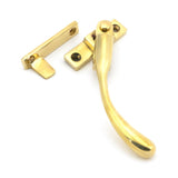 This is an image showing From The Anvil - Polished Brass Night-Vent Locking Peardrop Fastener - RH available from trade door handles, quick delivery and discounted prices