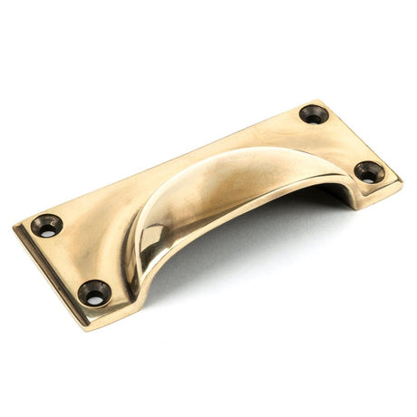 This is an image showing From The Anvil - Aged Brass Art Deco Drawer Pull available from trade door handles, quick delivery and discounted prices