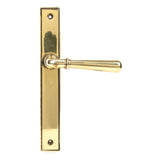 This is an image showing From The Anvil - Aged Brass Newbury Slimline Lever Latch Set available from trade door handles, quick delivery and discounted prices